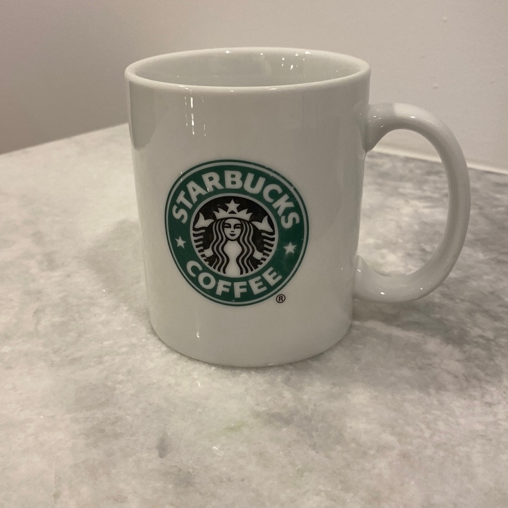 Starbucks coffee mug.